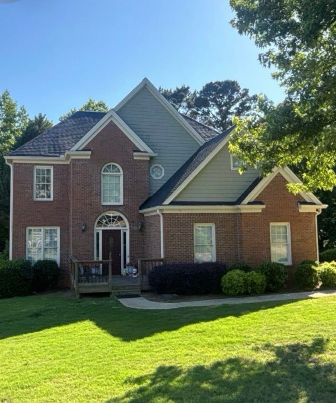 A Roof Built Right on a Beautiful Brick Home image