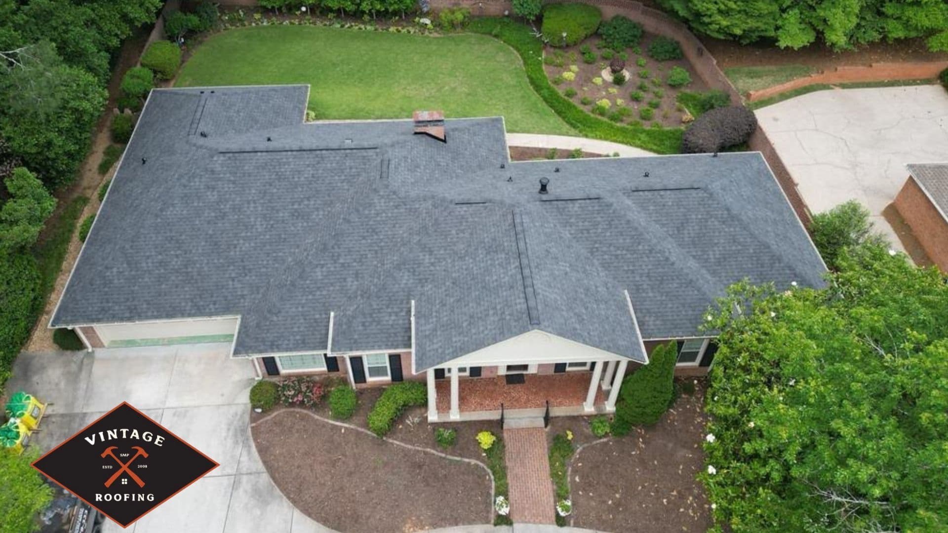 Project Atlas Pinnacle Pristine Shingles Give This Home a Sharp New Look image