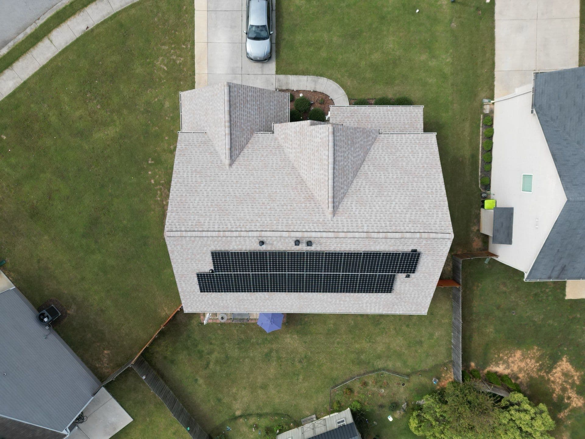 Roof Upgrade with Atlas Pinnacle Pristine Shingles in Residential Neighborhood image